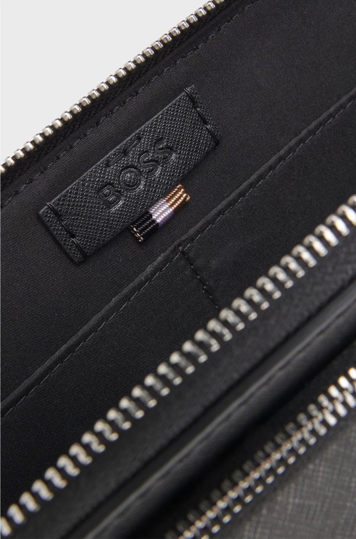 STRUCTURED CROSSBODY BAG WITH BRANDED TRIMS